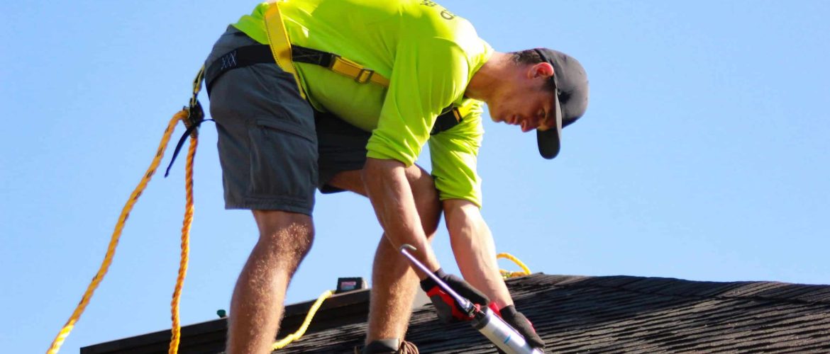 Commercial Roofing expert from Skymark roofing on roof