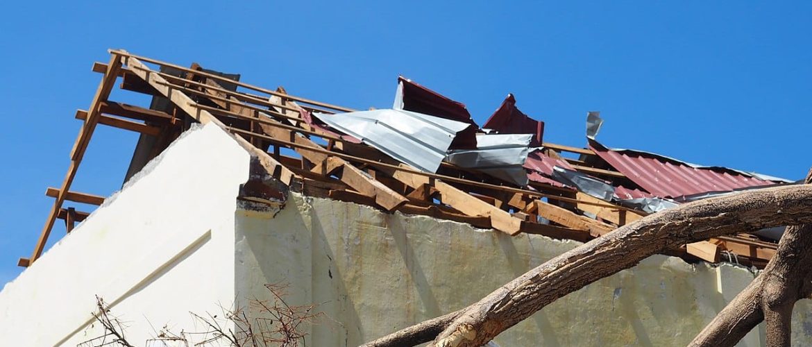 Skymark Storm Roof Damage Repair Severely damaged roof after hurricane winds