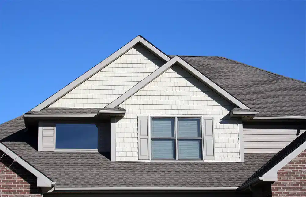 Gray shingle roof with multiple gables